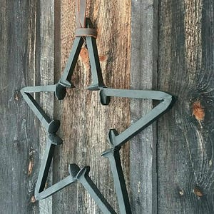 Rustic Repurposed Railroad Spike Barn Star. Three Piece Set Includes Railroad Spike Hook and Amish Harness Leather Strap