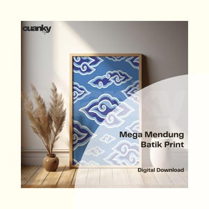May include: A framed wall art print featuring a blue Mega Mendung batik pattern with stylized cloud motifs. The text on the image reads cuanky, Mega Mendung Batik Print, and Digital Download. The print is displayed in a light wood frame.