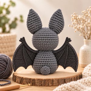Crochet bat plush pattern featuring a cute grey bat with oversized ears