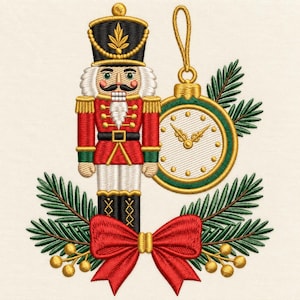 May include: An embroidered design featuring a nutcracker in a red, black, and gold uniform, a round gold-rimmed clock ornament with a hanging loop, green pine branches, and a large red bow with small gold berries at the base of the composition.
