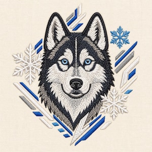 Puede incluir: Un diseño bordado que presenta la cabeza de un Husky siberiano con ojos azul brillante, rodeado de copos de nieve blancos y azules y barras diagonales geométricas en tonos azul, blanco y gris, sobre un fondo de tela color crema claro.
