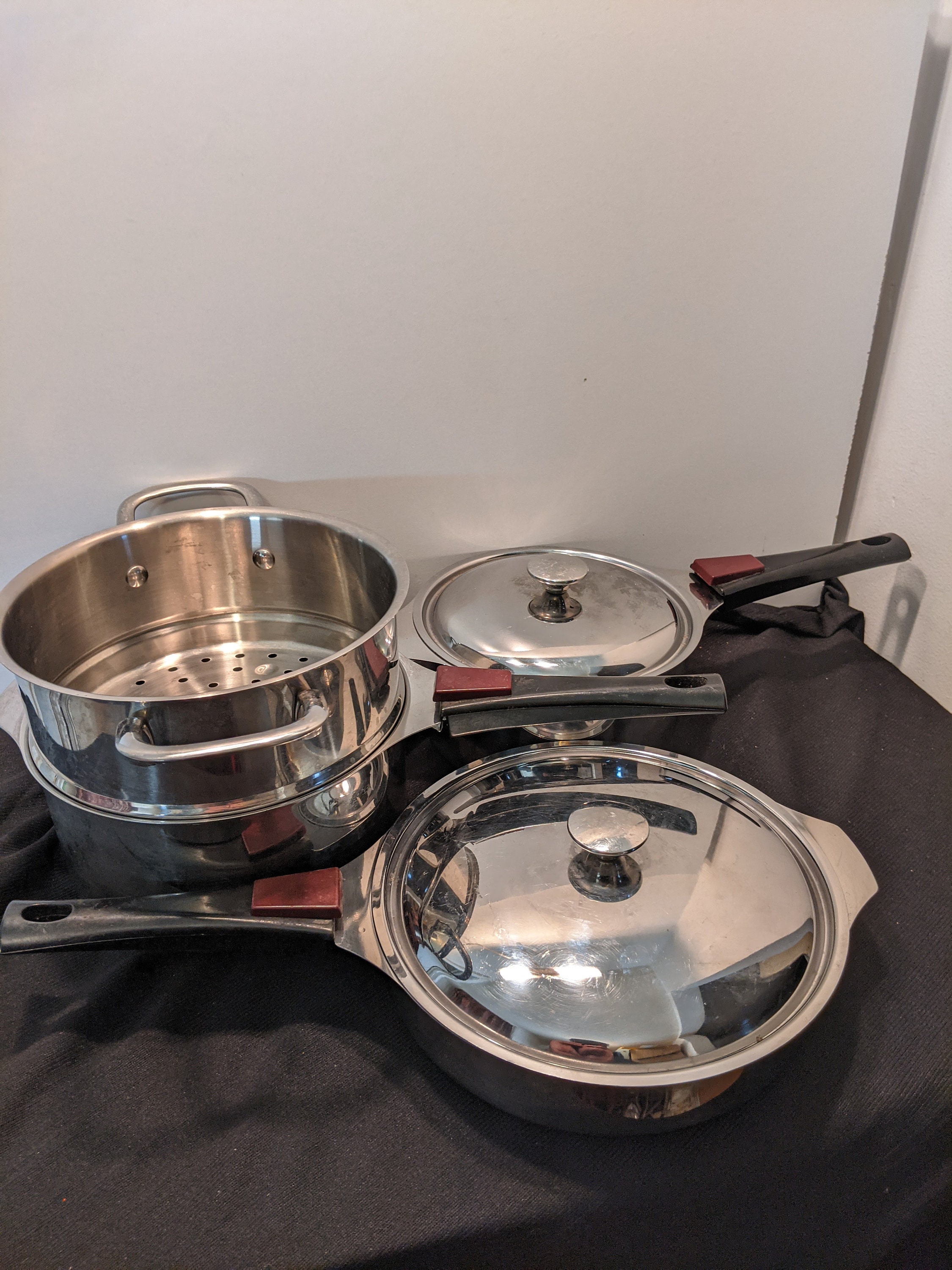 TRIPLINCX Stainless Steel Cookware 4 pans W/ Lids & 3 detachable Handles  France