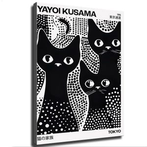 May include: A black and white canvas print featuring three stylised cats against a background of varying dot patterns. The text YAYOI KUSAMA, 1996, TOKYO, and Japanese characters are printed on the artwork. The cats have large white eyes.