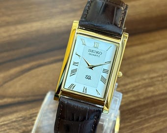 Vintage Seiko Tank Watch: Gold Case, White Dial, Brown Leather Strap, Japanese Quartz