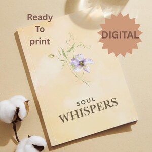 May include: A rectangular book with a light yellow cover featuring a watercolor illustration of a purple flower and green stems. The text reads Ready To print, DIGITAL, and SOUL WHISPERS in dark brown. A cotton sprig is visible in the corner.