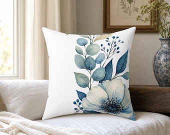 Zierkissen mit patinablauem botanischem Eckmuster