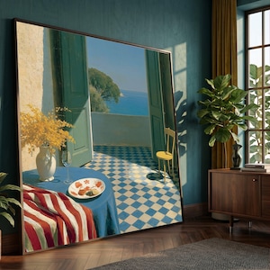 May include: A large rectangular framed wall art print depicting a Mediterranean balcony scene with a blue and white checkered floor, a round table with a blue cloth, a vase of yellow flowers, a plate of food, and a yellow chair overlooking the sea.