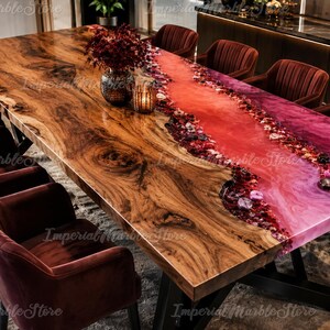 May include: A rectangular dining table featuring a live-edge wood slab with a central river design made of pink and red resin, embedded with decorative stones. The table is supported by black metal legs and surrounded by six dark red velvet chairs.