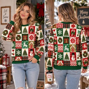 May include: A long-sleeve sweatshirt featuring a festive patchwork pattern of red, green, and white squares. The design includes illustrations of Christmas trees, snowmen, reindeer, gingerbread houses, snowflakes, and gifts on a grid background.