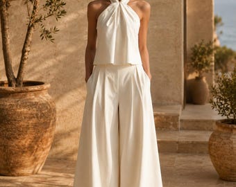Conjunto de dos piezas para mujer, top halter sin mangas, pantalón de talle alto y pierna ancha, ideal para vacaciones.