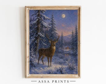 May include: A framed art print featuring a brown deer standing in a snowy forest at twilight. The scene includes tall pine trees covered in snow, a glowing full moon in a dark blue sky, and a small cabin with lit windows. Text reads ASSA PRINTS.