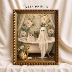 May include: A framed wall art print titled ASSA PRINTS featuring a fluffy cat and a white ghost sitting in a clawfoot bathtub filled with bubbles. The scene is set against a floral wallpaper background with a vase of white flowers and candles.