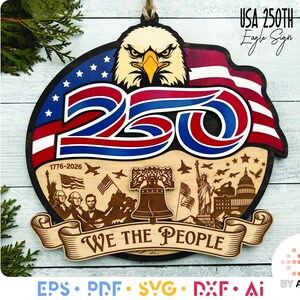 May include: A circular wooden sign featuring a bald eagle head above the number 250 in red, white, and blue. The lower section displays laser-engraved imagery of the Liberty Bell, the Statue of Liberty, and U.S. presidents with the text WE THE PEOPLE.