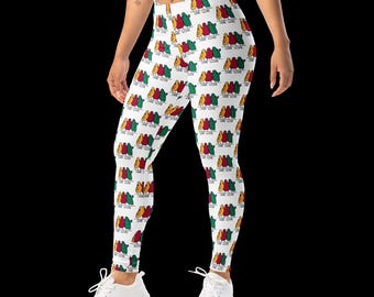 "Weiße ""One Love"" gemusterte Leggings."