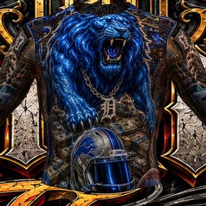 May include: A long-sleeve shirt featuring a vibrant graphic of a roaring blue lion wearing a chain with a letter D pendant, positioned above a pile of cash and a silver football helmet with a blue lion logo, set against a dark, ornate background.