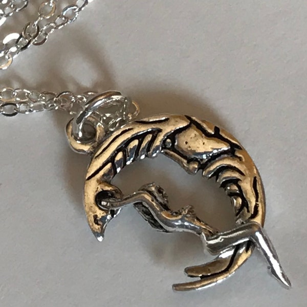 Lady riding/swinging on moon pendant silver  with chain