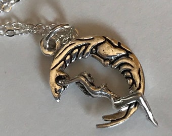 Lady riding/swinging on moon pendant silver  with chain