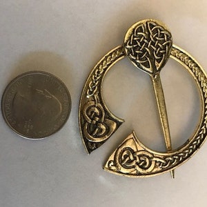 gold celtic penannular, fibula, cloak clasp, cape closure