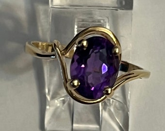 Amethyst ring in 14 Karat gold size 7.5