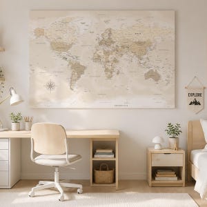 May include: A large rectangular wall map of the world in shades of beige and cream, featuring detailed continents, oceans, and a compass rose. To the right, a small white pennant hangs on the wall with the word EXPLORE and a mountain graphic.