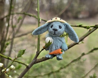 Miniature bunny toy in chicken hat matchbox bed Easter rabbit