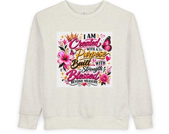 Bluza dla malucha „Jestem stworzona z przeznaczeniem, zbudowana z siłą” | Inspiracja kwiatowym motylem