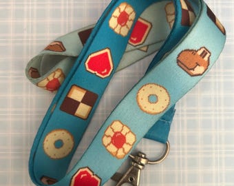 Yoshi's Cookie | Lanyard Nintendo Retro Collections Keychain and Convention Badge ID Holder