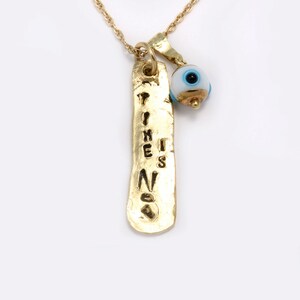 14 Karat Yellow Gold Handmade &quot;Time is Now&quot; Pendant with Silver Evil Eye Charm