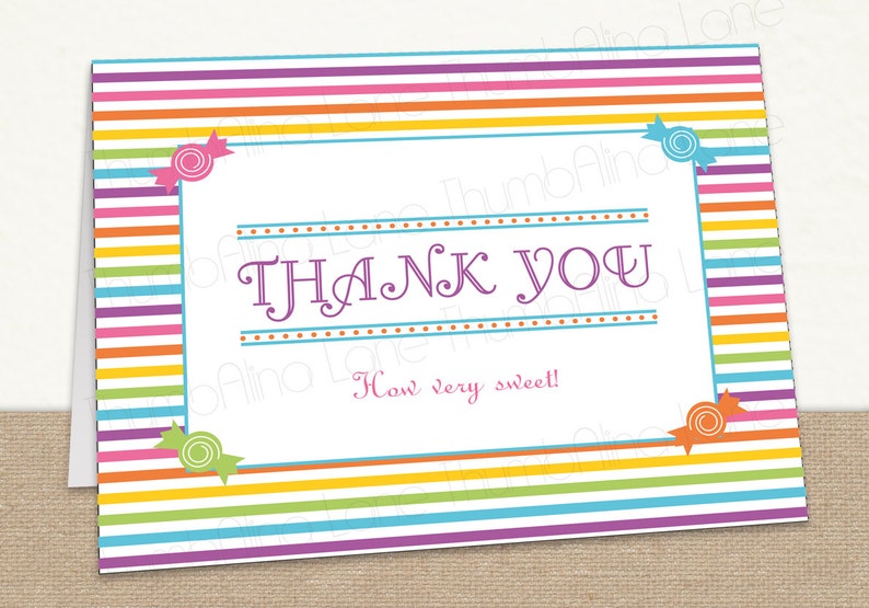 May include: A colorful striped thank you card with candy-shaped designs and the text "THANK YOU" in purple lettering. The text "How very sweet!" is written in pink below the main text.