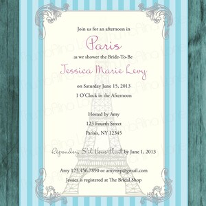 May include: A light blue and white striped invitation with a silver ornate border. The invitation is for a bridal shower in Paris for Jessica Marie Levy on Saturday, June 15, 2013 at 1 o'clock in the afternoon. The invitation features a silhouette of the Eiffel Tower.