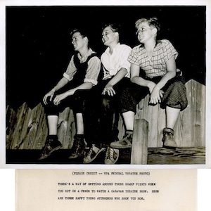 May include: Black and white photograph of three young people sitting on a wooden fence. The photograph is from the WPA Federal Theatre Project. The text at the bottom reads: "THERE'S A WAY OF GETTING AROUND THOSE SHARP POINTS WHEN YOU SIT ON A FENCE TO WATCH A CARAVAN THEATRE SHOW."