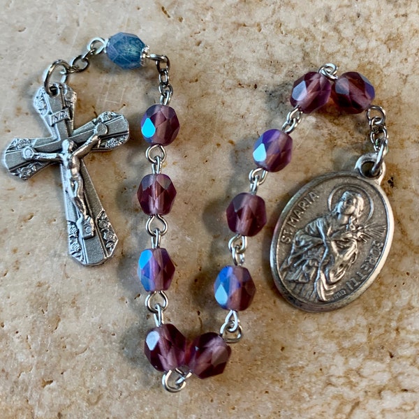 Tenner morado púrpura y azul de Santa María Goretti