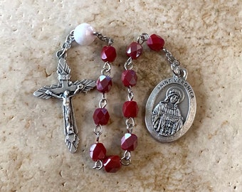 St. Veronica Red Glass Rosary Tenner