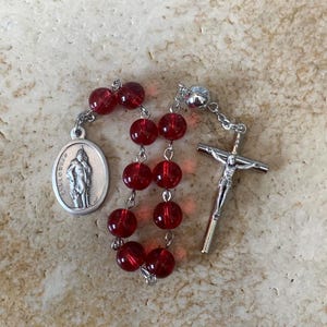 St. Florian Red Glass Rosary Tenner