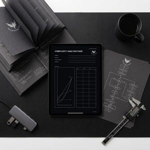 May include: A black tablet displaying a Complexity Analysis Page with a graph and table, alongside a black notebook with white text, a black mug, a grey USB-C hub, a black paper with a flowchart, and a digital calliper measuring 1.30 cm.