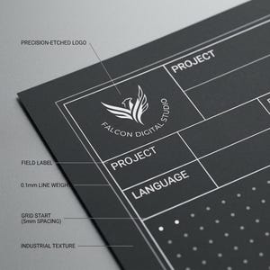 May include: A dark grey sheet with white printed technical details including a Falcon Digital Studio logo, project and language field labels, 0.1mm line weights, a grid with 5mm spacing, and an industrial texture with precision-etched markings.