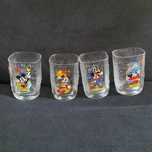 Walt Disney World Vintage Collectible Millenium McDonalds Drinking Glasses.  Set of 4         (France - 2000)