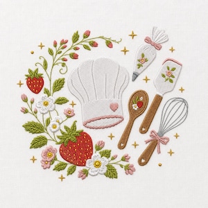 May include: An embroidery design on white fabric featuring a white chef hat with a pink heart, a piping bag, a spatula, and a whisk. The kitchen tools are surrounded by a wreath of green strawberry vines, red strawberries, and white flowers.