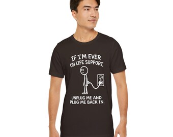 Camiseta con el lema "Si alguna vez estoy conectado a un soporte vital, desconéctenme y vuelvan a conectarme"