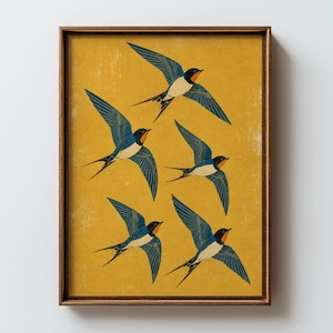 May include: A rectangular wall art print featuring five swallows in flight against a solid, vibrant yellow background. Each bird displays deep blue wings with detailed feather lines, white underbellies, and orange markings on their throats.