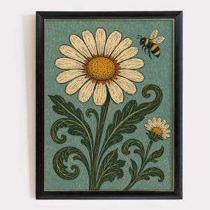 May include: A framed wall art print featuring a large white daisy with a yellow center and a smaller daisy on a muted teal background. A small bee is depicted in flight near the top right. The illustration includes dark green, swirling leaves.