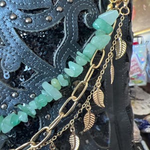Three chain, Gold, green rock, gold strand with leaf charms, includes basic clips. Western Jewelry, bling for your boots.