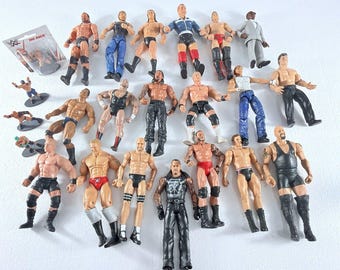 WWE Wrestlers LOT of 23 Action Figures The Undertaker, The Rock, The Giant VTG
