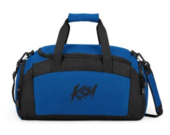 Bolsa de gimnasio/deportiva con logo KSM Brushstroke, amarilla y negra.