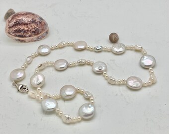 Delicate pearl necklace made of real Keshi and coin beads