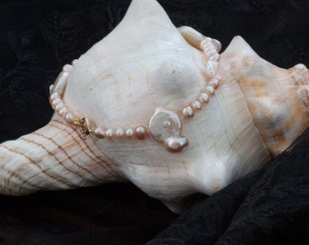 Real pearl jewelry made of pink salmon beads, long sweater chain and bracelet