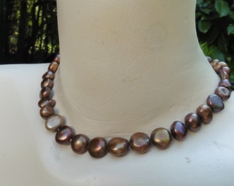 Brown real freshwater pearls with large feather ring