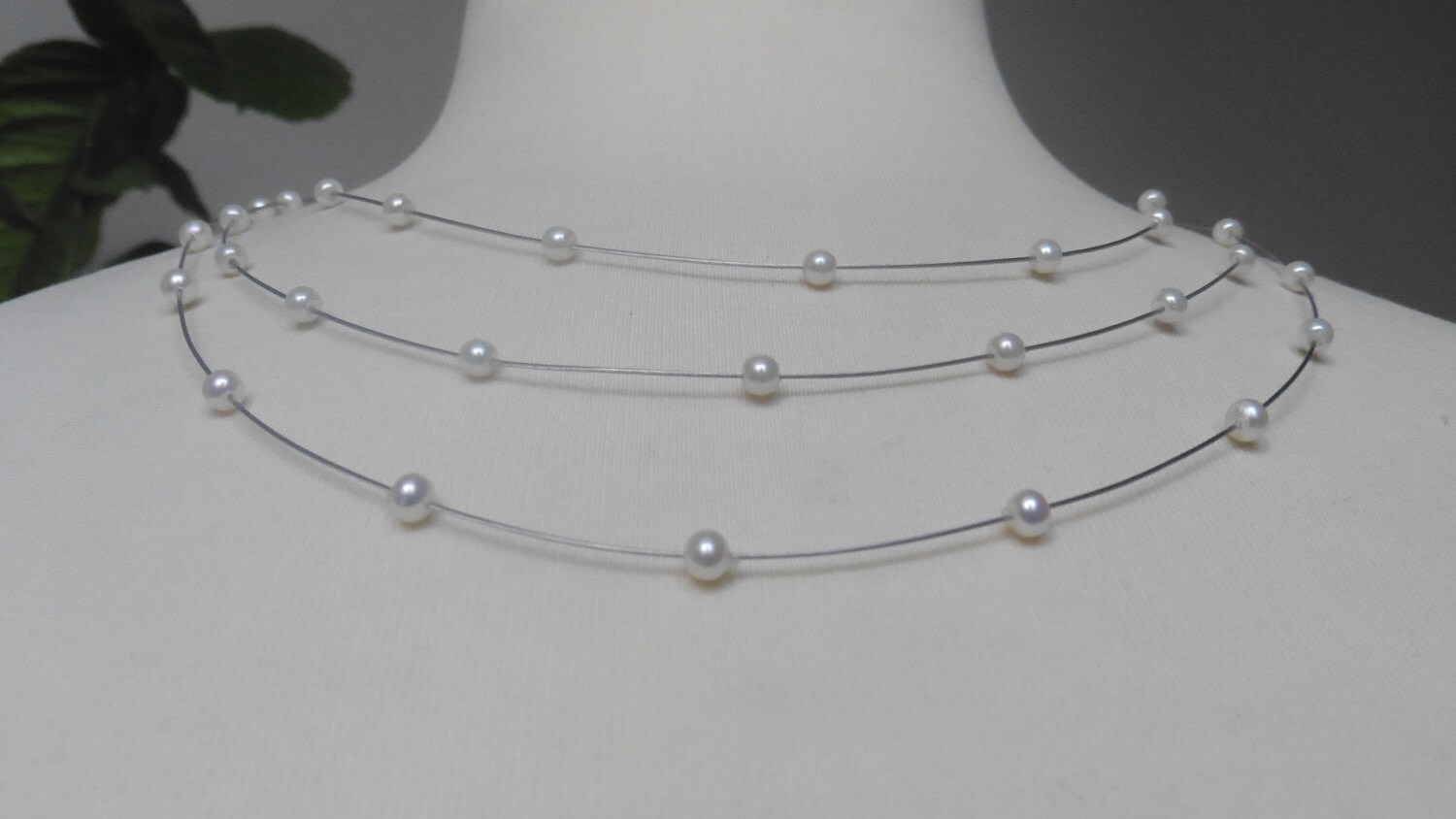 14mm Floating Pearls with 18k WG Triple Leaf Hook