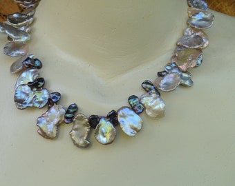 Exclusive necklace of large natural Keshi pearls up to 30 mm, summer party, shiny metallic