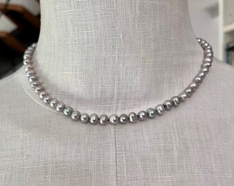 Silver-grey delicate pearl necklace, oval pearl shape, simple sweater necklace